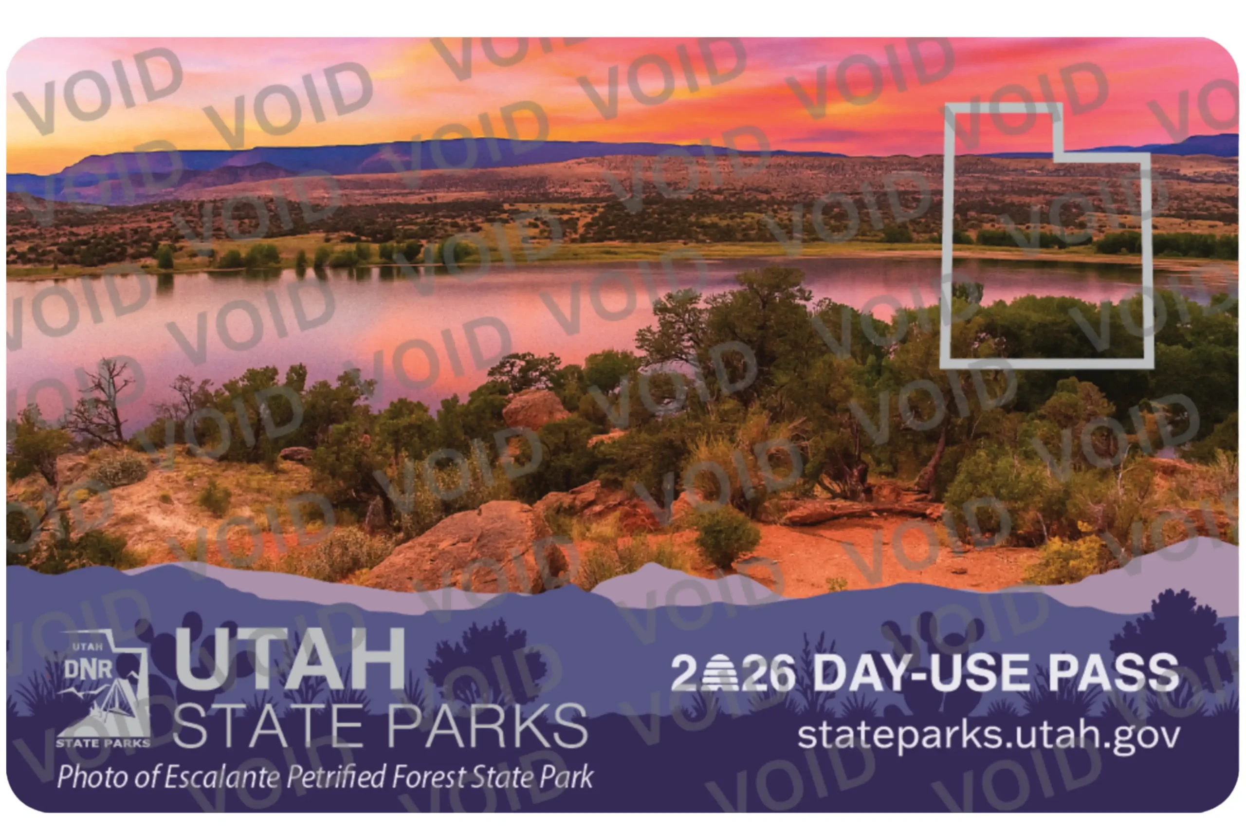 Utah State Parks day-use pass with a sunset view of Escalante Petrified Forest State Park.